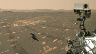 photo of NASA's Perseverance rover next to the Ingenuity helicopter on the surface of Mars