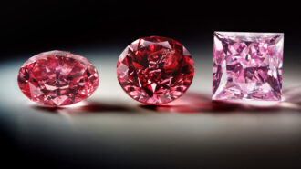 three diamonds in varying shades of pink