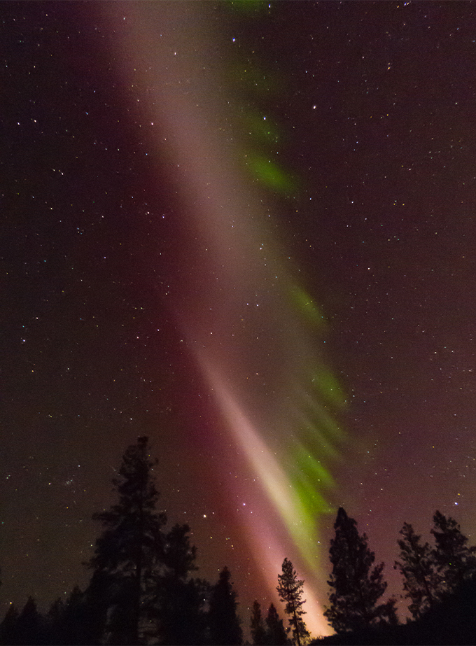 green stripes in sky called picket fence